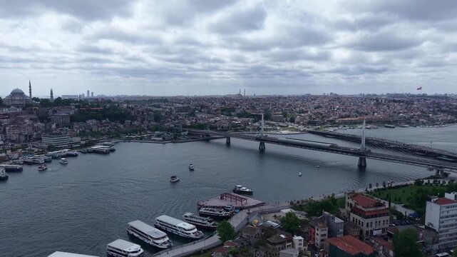 Cinematic Drone View of Hali&ccedil; Bridge, Golden Horn and Istanbul City Skyline