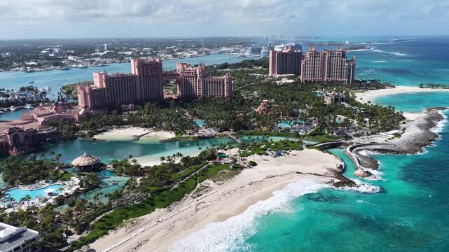 Atlantis Hotel In Paradise Island In Nassau Bahamas. Beach Landscape. Resort Scenery. Downtown City. Atlantis Hotel In Nassau Bahamas. Caribbean Background.