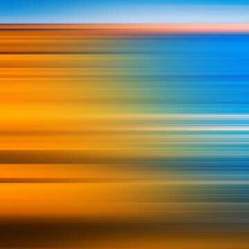 Orange to sky blue horizon abstract background with motion blur streaks