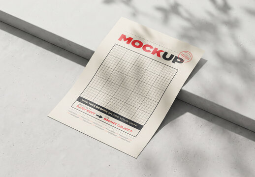 Flyer Page Resting  on Concrete Surface Mockup