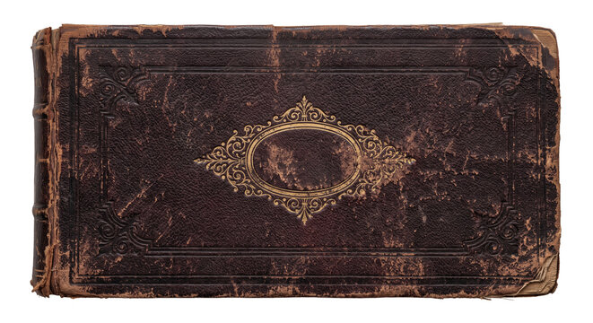 Antique leather bound book cover with ornate gold detailing and worn edges
