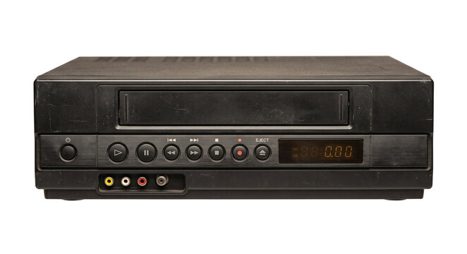 Vintage black VCR player with buttons and digital display on a white background
