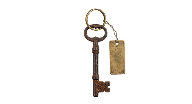 Antique rusty skeleton key with blank brass tag and keyring on white background