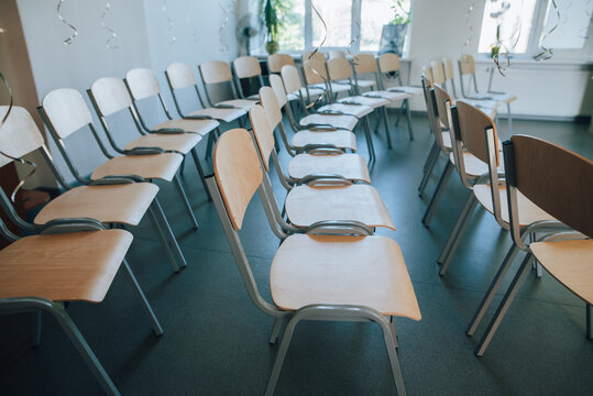 Rows of Chairs in Classroom or Conference Hall