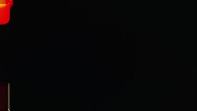 Molten lava dripping slowly in darkness