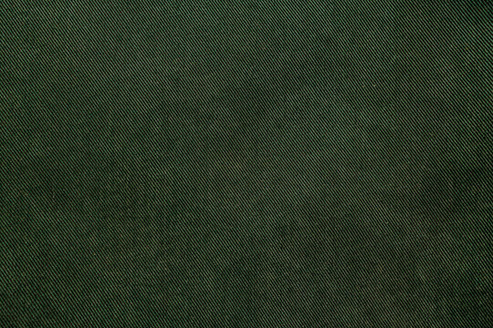 Dark green woven twill denim fabric texture