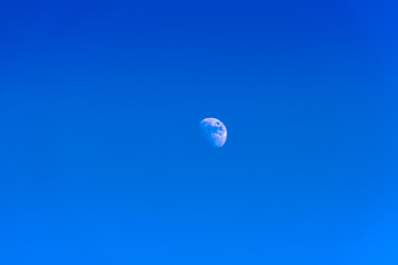 The moon in the blue sky © Ivan_Gatsenko