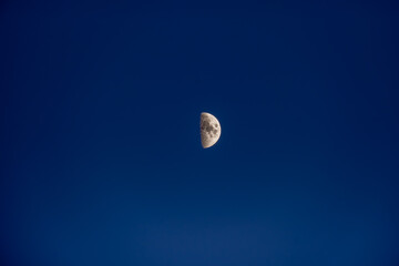 The moon in the evening sky © Ivan_Gatsenko