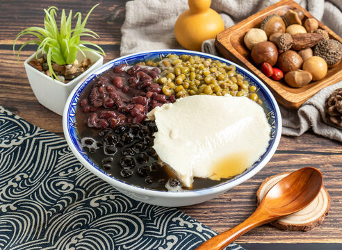 Traditional Tofu Pudding with Red Beans, Mung Beans and Tapioca Pearls in a Bowl
