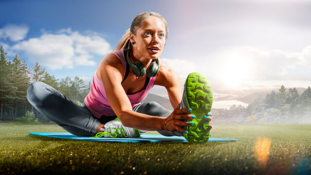 Fitness. A fit girl doing fitness exercises outdoors. An athletic woman working out. Photo of an athletic fitness model working out with dumbbells outdoors.