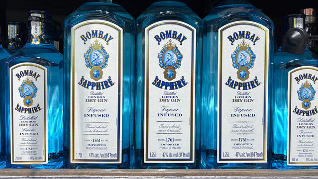 Bombay Sapphire gin display. Bombay Sapphire is an iconic London Dry gin renowned for its vibrant blue bottle.