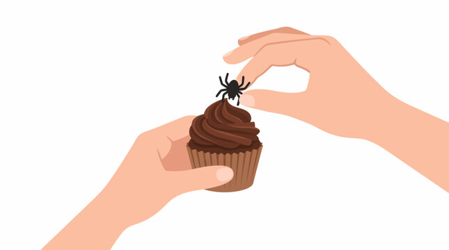 Decorating Chocolate Cupcake with Spider Topping for Halloween