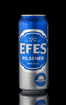 August 10, 2026, Tbilisi, Georgia Refreshing Efes Pilsener can glistening with droplets, showcasing its vibrant blue design against a dark backdrop