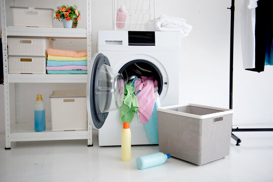 Modern Minimal Laundry Room Interior with Washing Machine at Home