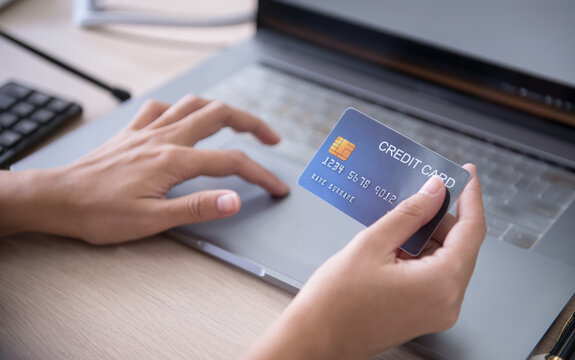 Online Shopping with Credit Card and Laptop for Secure Digital Payment