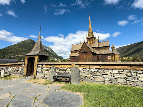 Wooden gate tower and Lom stave church, Innlandet, Norway