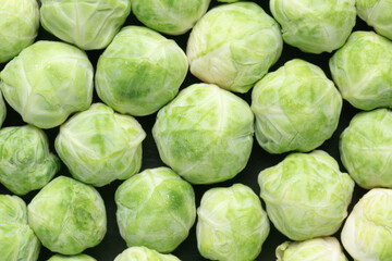 Fototapeta premium Top view of fresh Brussels sprouts for background.