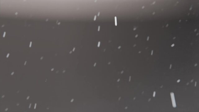 Reacting to appearing lights reflective droplet sharpening in studio macro with falling drops bokeh