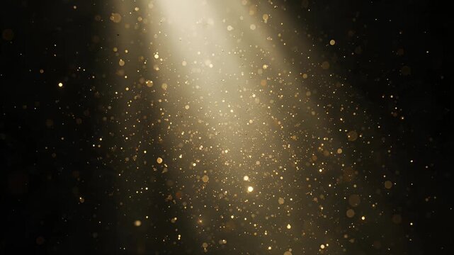 gold glitter particles in spotlight beam, sparkles and glow