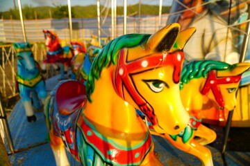 Colorful Carousel Horse at a Traditional Outdoor Amusement Ride © Aisyah Faiha