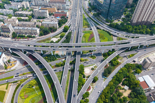 Top‑down aerial shot of complex multi‑level urban highway interchange