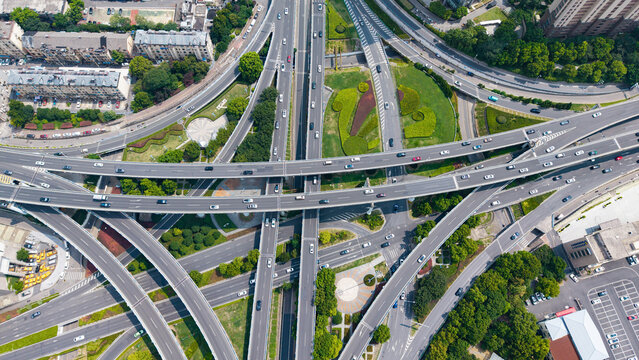Top‑down aerial shot of complex multi‑level urban highway interchange