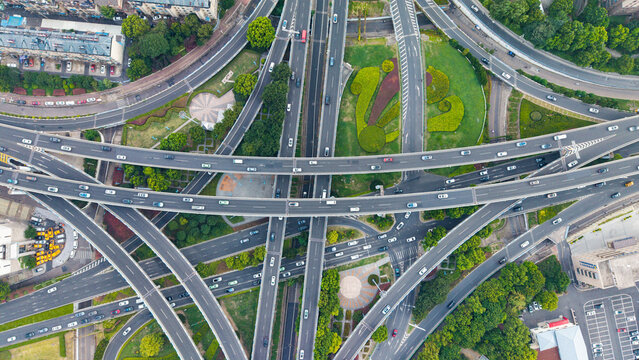 Top‑down aerial shot of complex multi‑level urban highway interchange