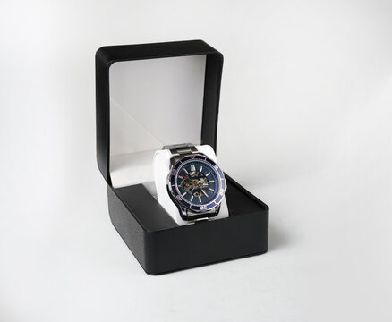 Automatic Skeleton Wristwatch Displayed in Elegant Black Gift Box on White Background