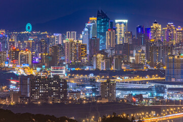 Taichung skyline with Ferris wheel and city lights at night © 柏佑 鄧