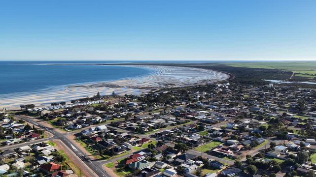 Moonta Bay, Yorke Peninsula, South Australia &ndash; 4K aerial drone view of tidal sand flats, Spencer Gulf, coastal town, beachfront house, residential streets, beaches and turquoise water