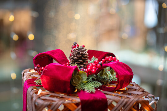 Christmas mock up box gift tied with red ribbon.