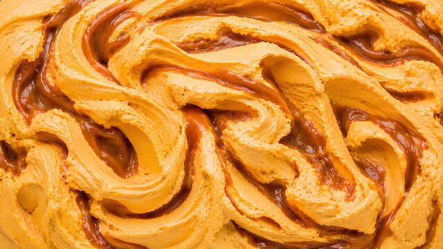 Creamy orange lucuma ice cream blended with rich dulce de leche ribbons, creating a colorful South American frozen dessert background.