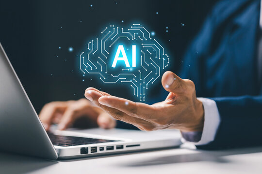 Business professional presents a glowing AI brain above a laptop, illustrating artificial intelligence, machine learning, automation, digital innovation, and future technology concept.