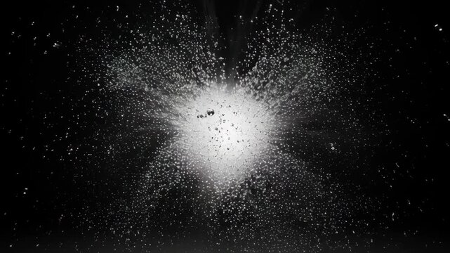 Water droplet explosion with fine particle cloud black background, abstract motion, dynamic splash effect, gray sphere with soft swirl and bright center, minimal digital art, bright circular splash