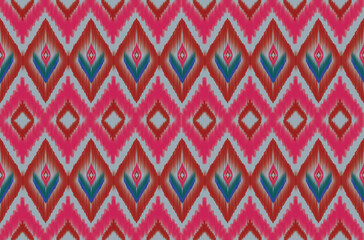 Seamless Ikat Diamond Pattern with Magenta Pink, Red and Green Blue Accents on Powder Blue Background © Watcharaporn