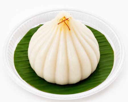 Modak in white plate for lord ganesha festival