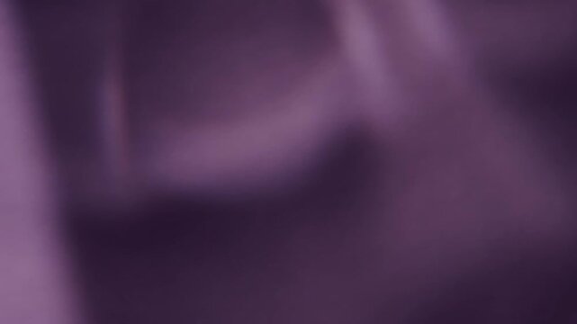 Blur visual glint. Lens flare. Defocused purple radiant optical flicker illuminated flash leak on abstract luminous gleam background.
