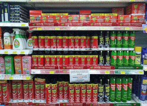 KUALA TERENGGANU MALAYSIA- AUGUST 11. 2026: Fully stocked retail supermarket shelf display featuring Ridsect and Baygon insect killer sprays and mosquito coils in a store in Malaysia.