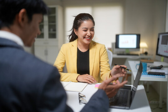 Smiling businesswoman in office meeting