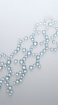 Clear water droplets arranged in DNA double helix pattern reflective smooth surface abstract biological concept