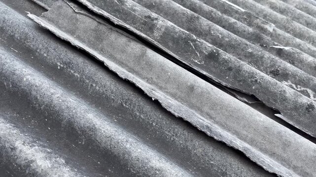 Broken and cracked asbestos roof texture background