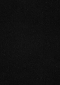 Dark black paper texture background surface featuring subtle fibrous material details suitable for minimalistic graphic design projects creative artistic visual arts compositions.