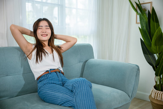 Happy woman feeling relax comfortable enjoying after homework