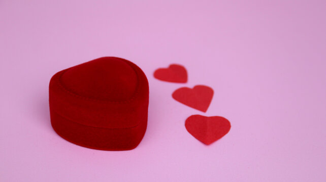Red velvet ring box with heart shape 