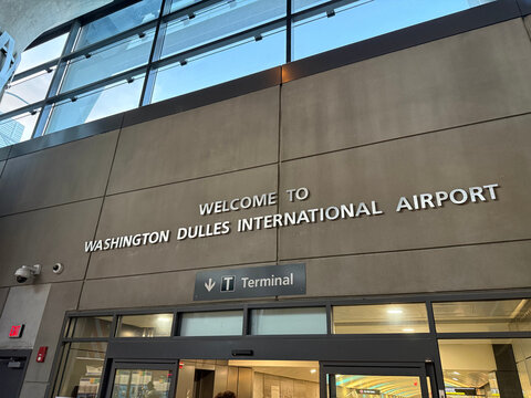 Welcome sign above a terminal entrance at Washington Dulles International Airport - Dulles, Virginia, USA - July 30, 2026