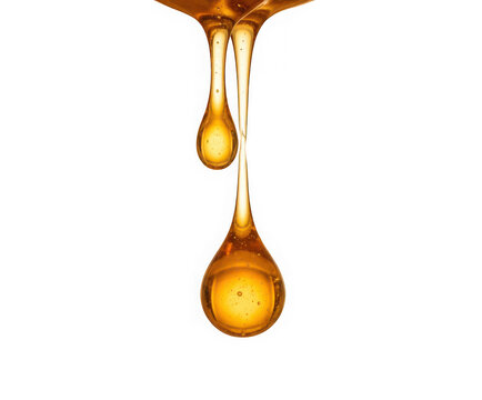 Golden honey drops falling isolated on transparent background