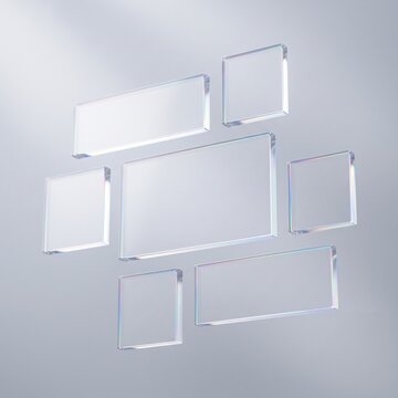 Collection of transparent iridescent glass rectangles and squares arranged on gray background, representing glassmorphism design, modern user interface elements and digital app template.