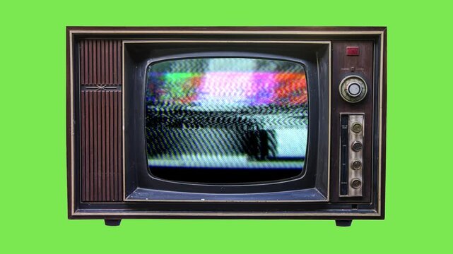 Retro television set with static noise interference on screen isolated on green background
