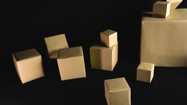 Group of brown cardboard boxes of various sizes orbiting on a solid black background, showcasing concepts of logistics, packaging, moving, supply chain, and e commerce fulfillment