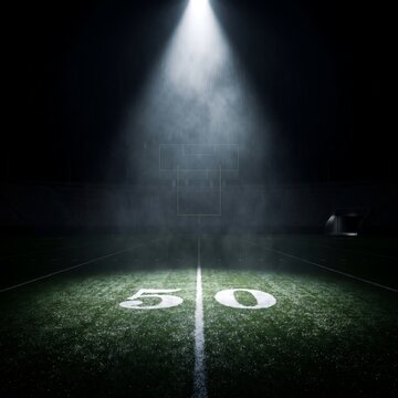 Dramatic night football field under stadium lights with glowing 50 yard line
